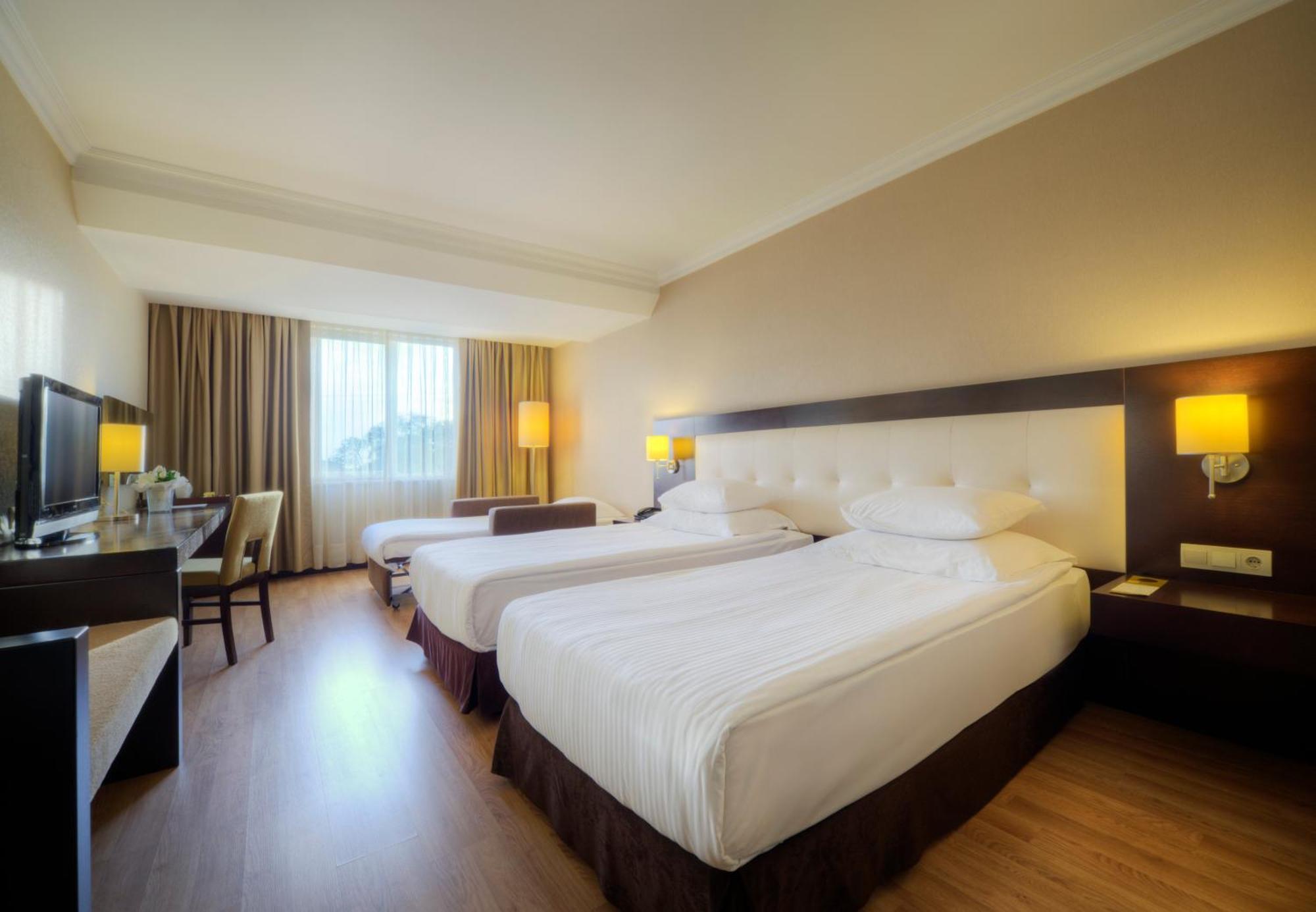 Deluxe Dreibettzimmer
