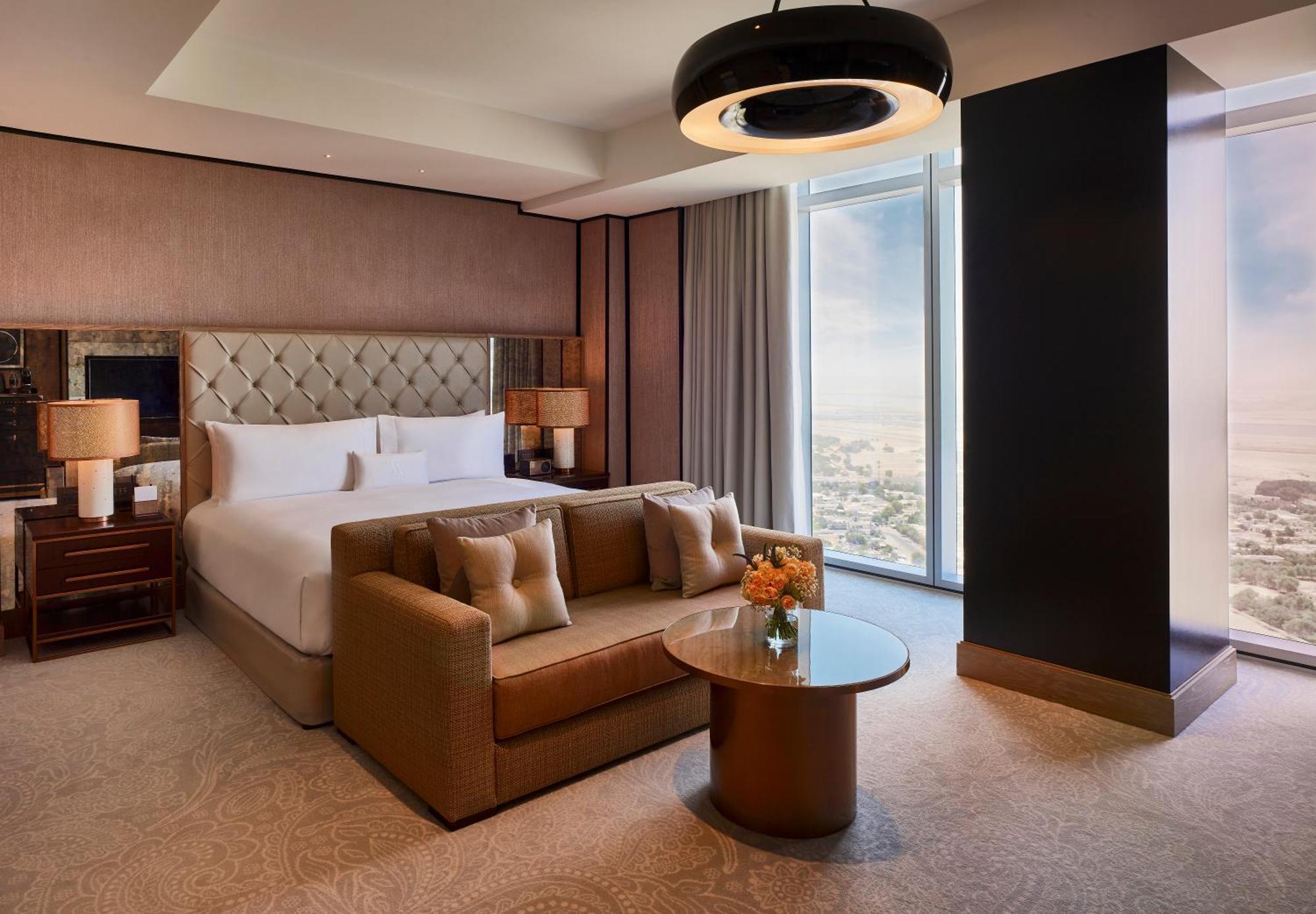 Deluxe Zimmer mit Kingsize-Bett und Stadtblick