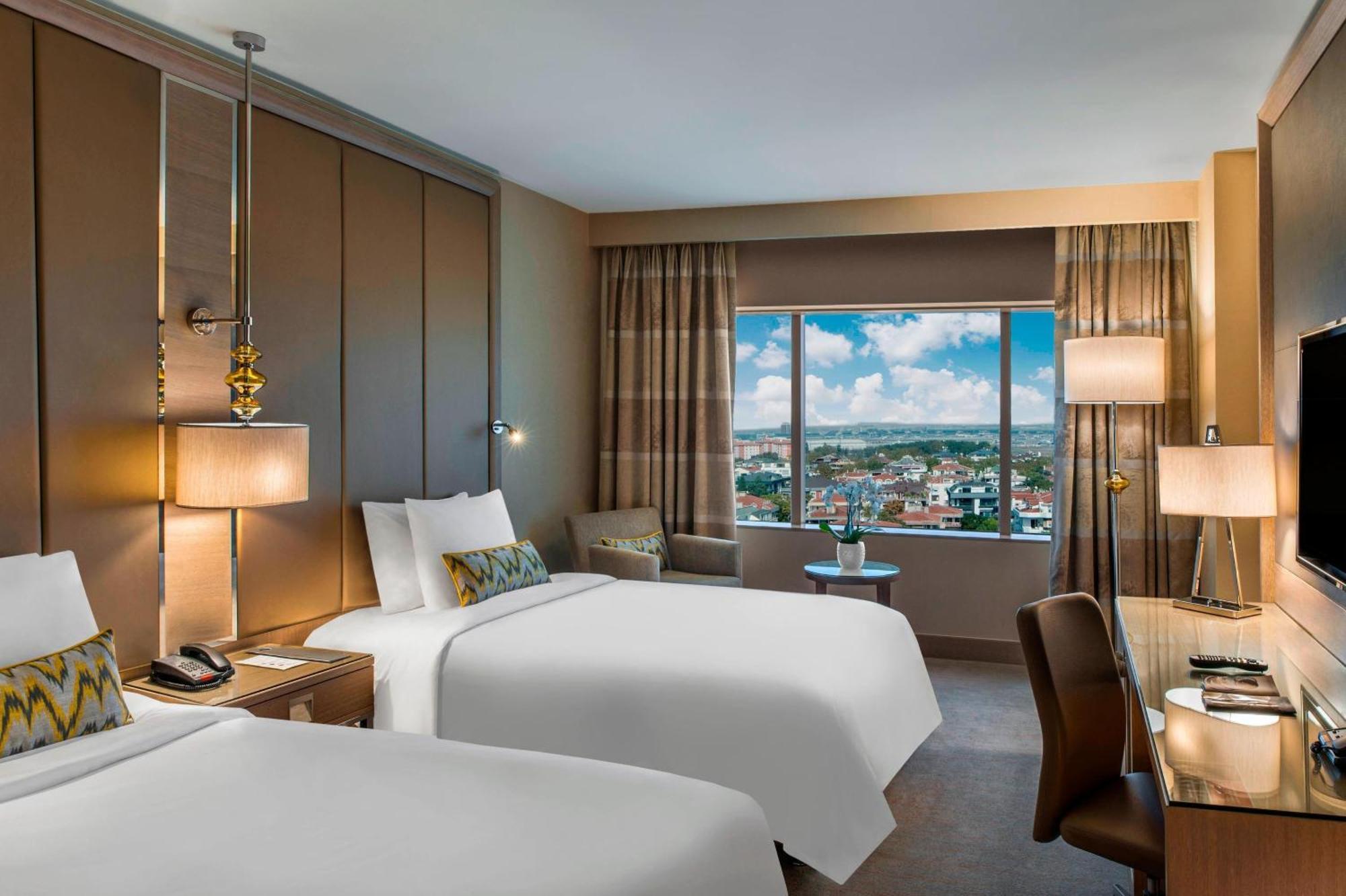 Executive Zweibettzimmer mit Stadtblick und Zugang zur Club Lounge