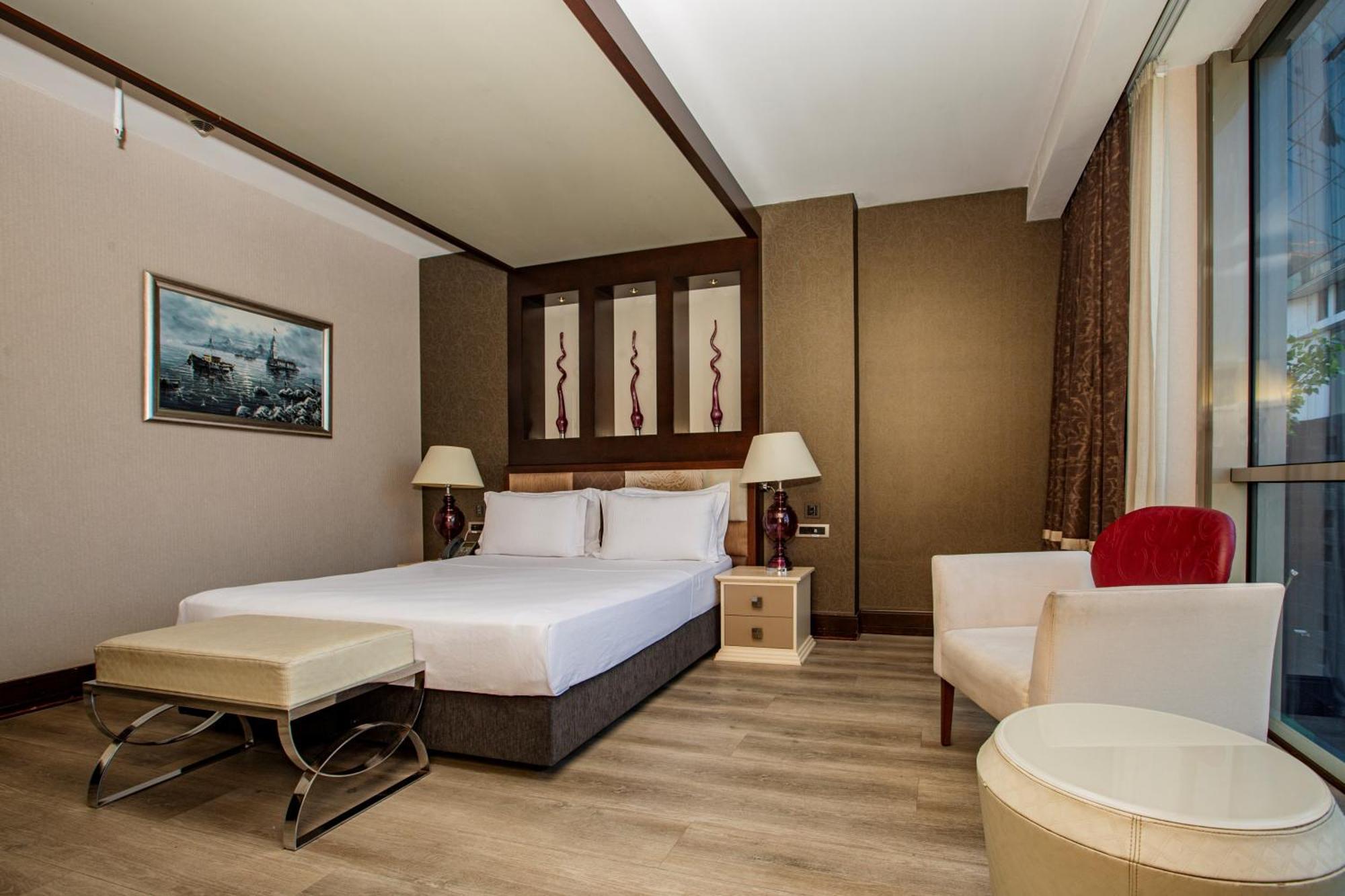 Deluxe Zimmer mit Kingsize-Bett und Balkon