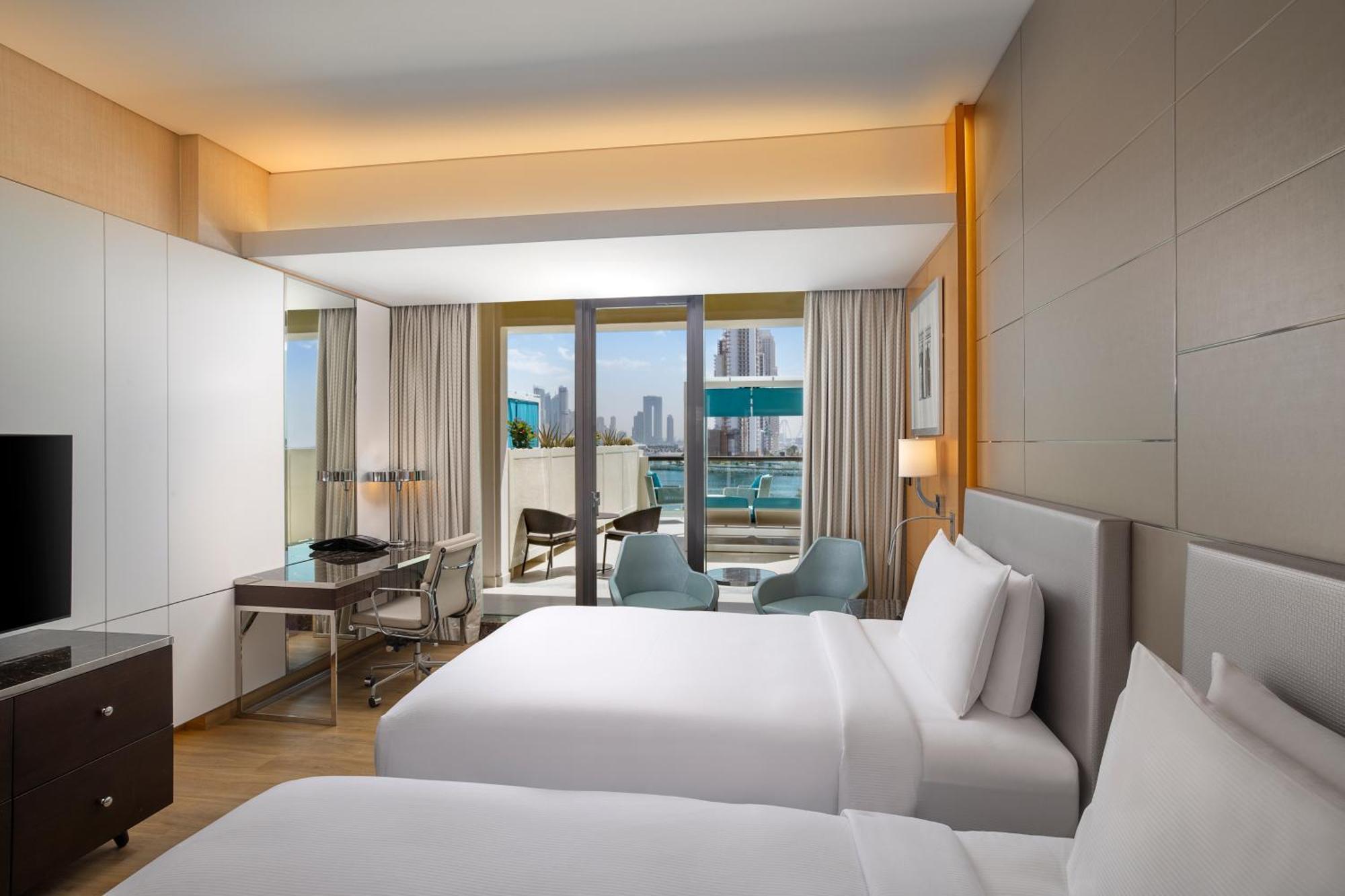 Doppelzimmer mit 2 Doppelbetten und Meerblick – Cabana