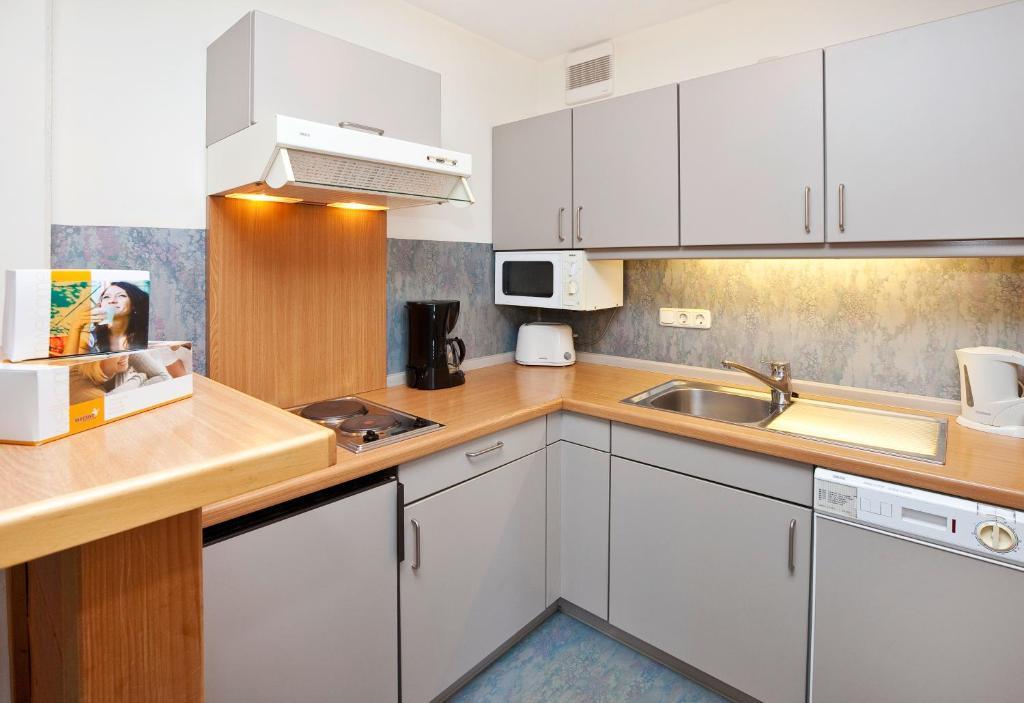 Apartment mit 2 Schlafzimmern und Blick auf die Straße - Westseite