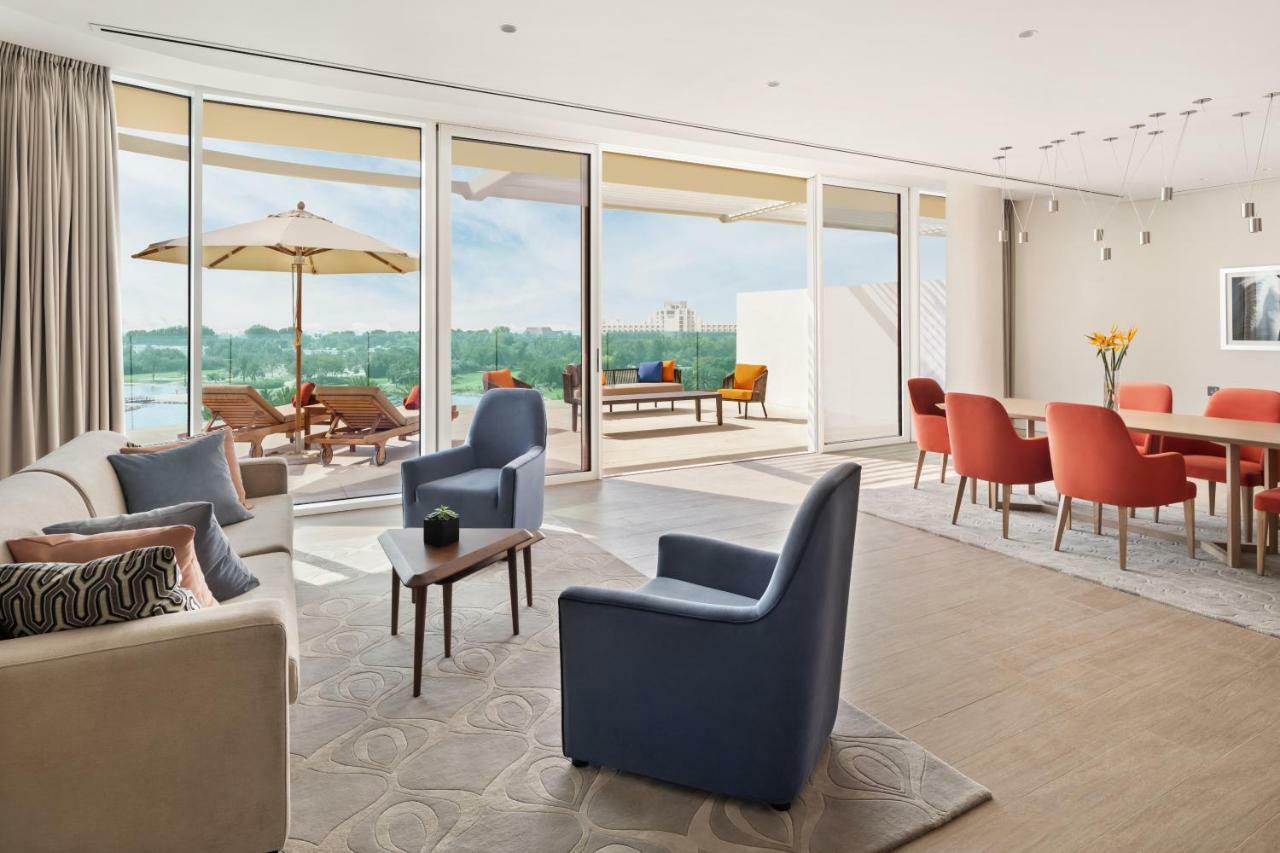 One Bedroom Terrace Suite with Access to Lounge & 3 Pools